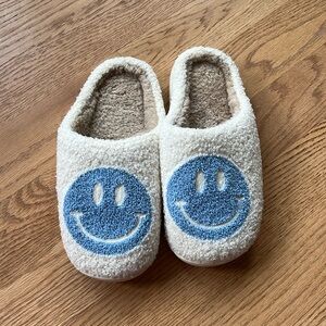 Smiley face slippers brand new!
